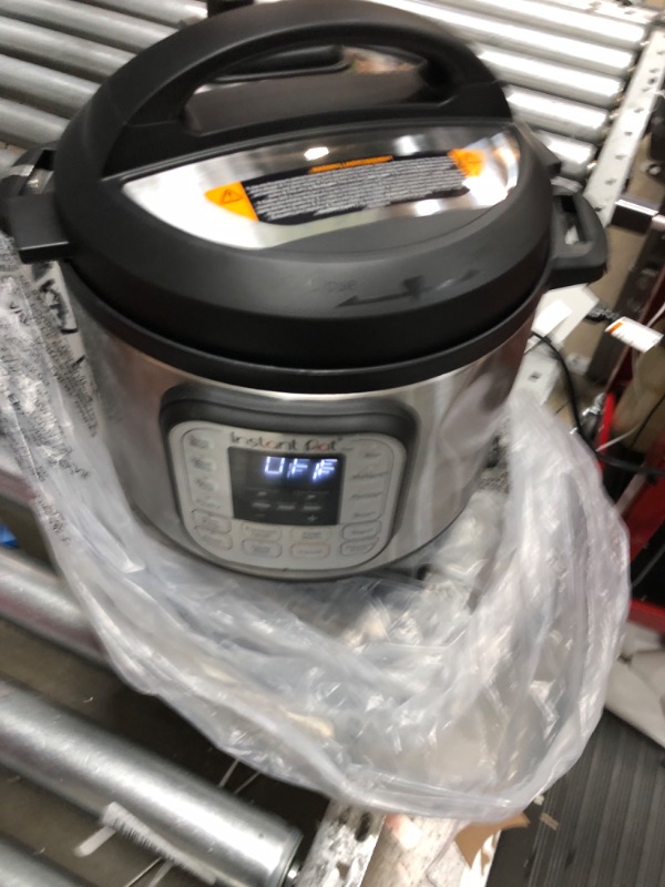 Photo 2 of **DENTED, SHOWN IN PHOTO** Instant Pot Duo 7-in-1 Electric Pressure Cooker, Slow Cooker, Rice Cooker, Steamer, Sauté, Yogurt Maker, Warmer & Sterilizer, Includes App With Over 800 Recipes, Stainless Steel, 6 Quart 6QT Duo