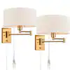 Photo 1 of 14 in. Light Brass Modern Wall Sconce with Standard Shade
