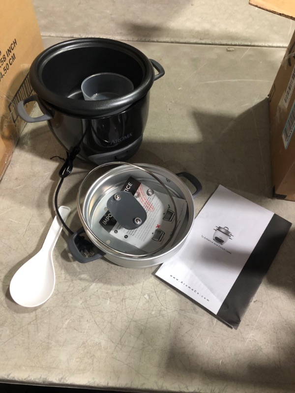 Photo 3 of ***USED - LIKELY MISSING PARTS - UNABLE TO VERIFY FUNCTIONALITY***
Aroma Housewares 6-Cup (Cooked) Pot-Style Rice Cooker and Food Steamer, Black ARC-743-1NGB