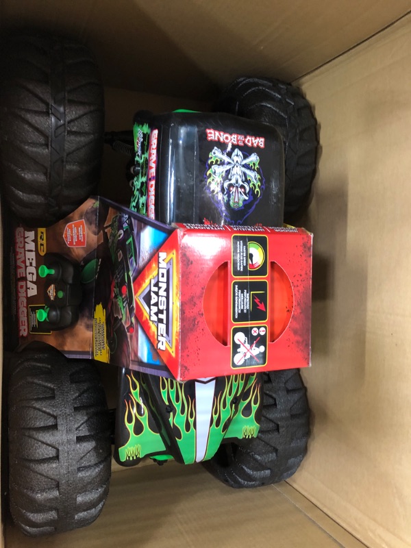 Photo 1 of Monster Jam, Official Mega Grave Digger All-Terrain Remote Control Monster Truck, Over 2 Ft. Tall, 1:6 Scale, Kids Toys for Boys and Girls Ages 4-6+ Mega Grave Digger (V2)