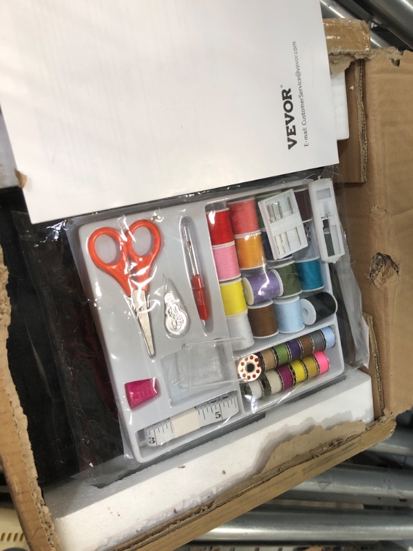 Photo 1 of VEVOR Mini Sewing Machine for Beginners and Kids, Sewing Machines with Reverse Sewing and 38 Built-in Stitches, Dual Speed Portable Sewing Machine with Extension Table, Sewing Kit for Household Travel White&Orange