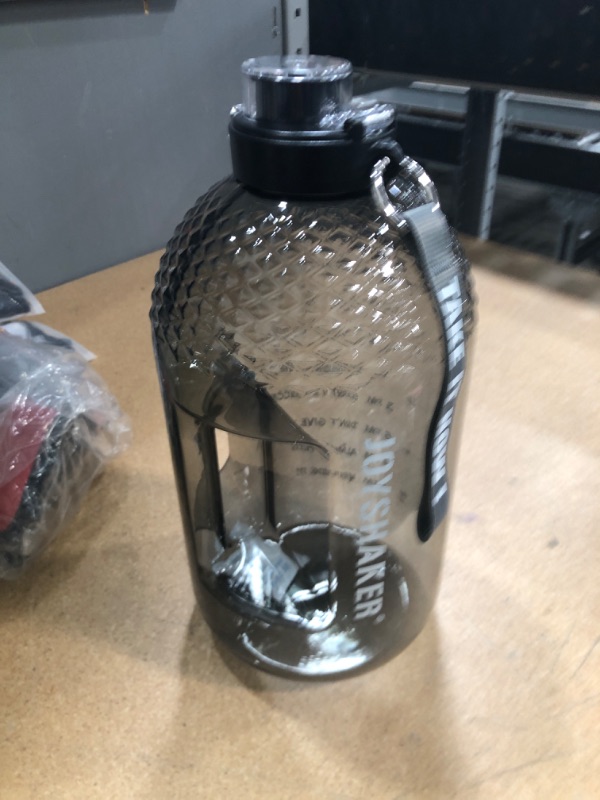 Photo 1 of 100oz clear water bottle 