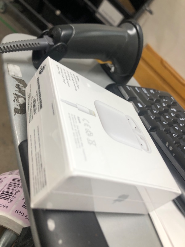 Photo 1 of **factory sealed**
Apple AirPods with Charging Case 