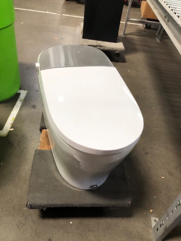 Photo 2 of ***READ NOTES***(FOR PARTS)
Luxury Smart Bidet Toilet with Auto Open/Close Lid, Heated Toilet Seat, Instant Warm Water and Dryer, Smart Toilet with Night Light, Digital Display ST03 Plus