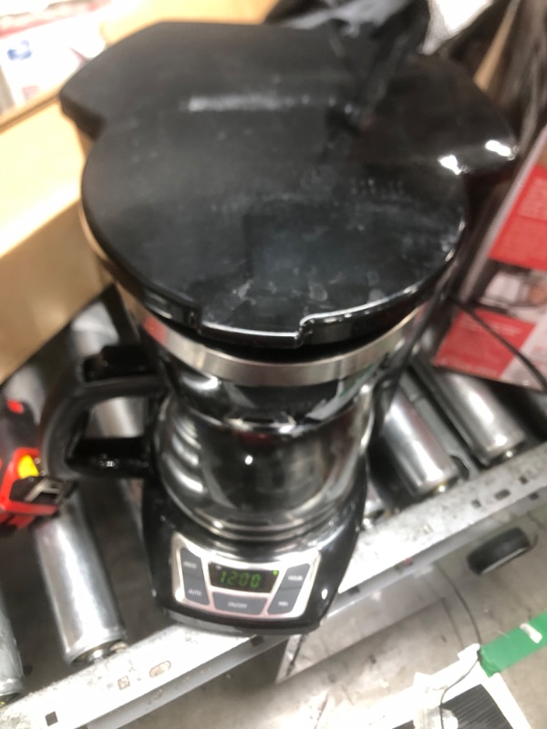 Photo 2 of **lid does not close properly**
Black+Decker CM1160B 12-Cup Programmable Coffee Maker, Black/Stainless Steel