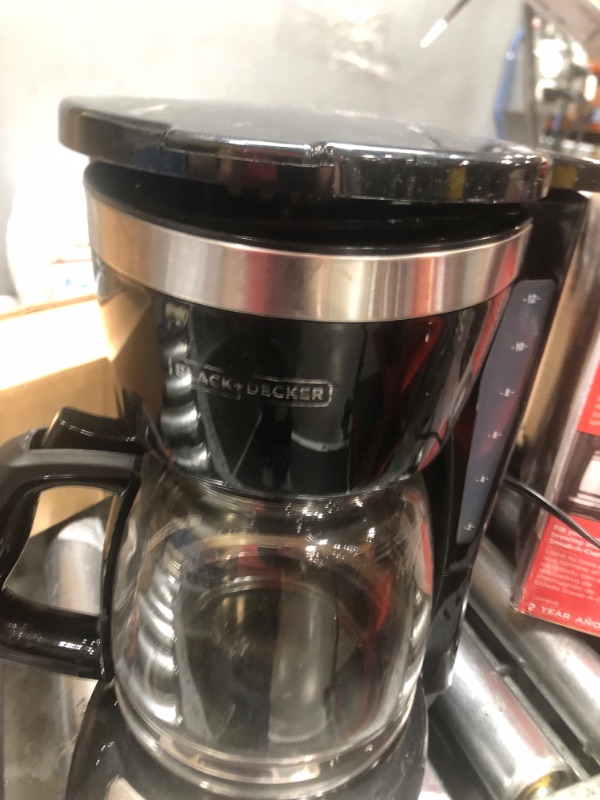 Photo 3 of **lid does not close properly**
Black+Decker CM1160B 12-Cup Programmable Coffee Maker, Black/Stainless Steel