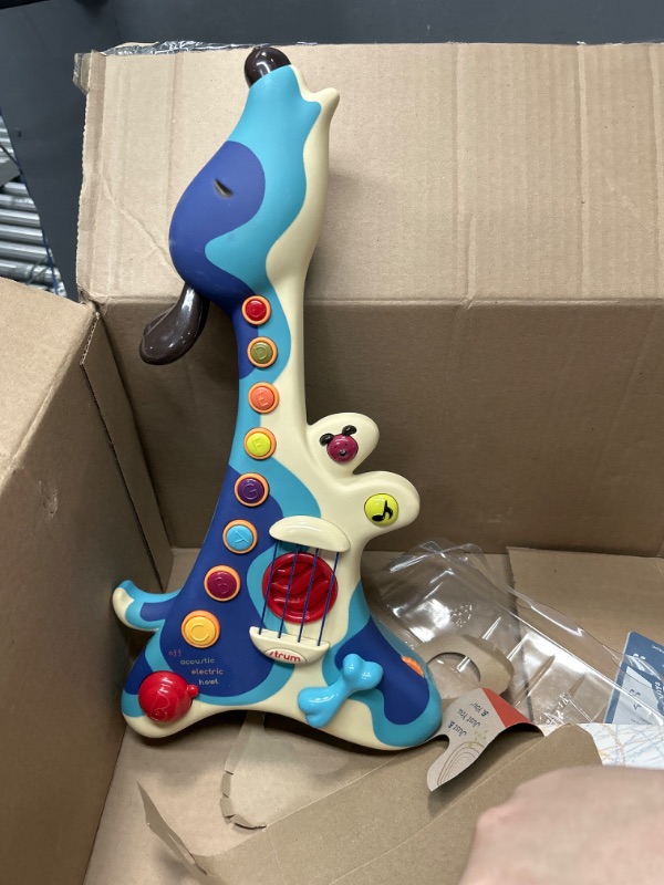 Photo 2 of B. toys- Woofer- Interactive Dog Guitar- Musical Toys- 3 Music Modes- Big & Colorful Buttons – 2 Years +