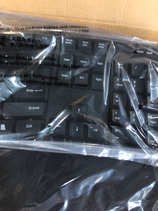 Photo 4 of Amazon Basics Ergonomic Wireless Keyboard Mouse Combo - QWERTY - Black