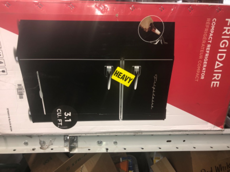 Photo 1 of **MINOR DENT**
Frigidaire 3.2 Cu. Ft. 2-Door Compact Fridge - Black
