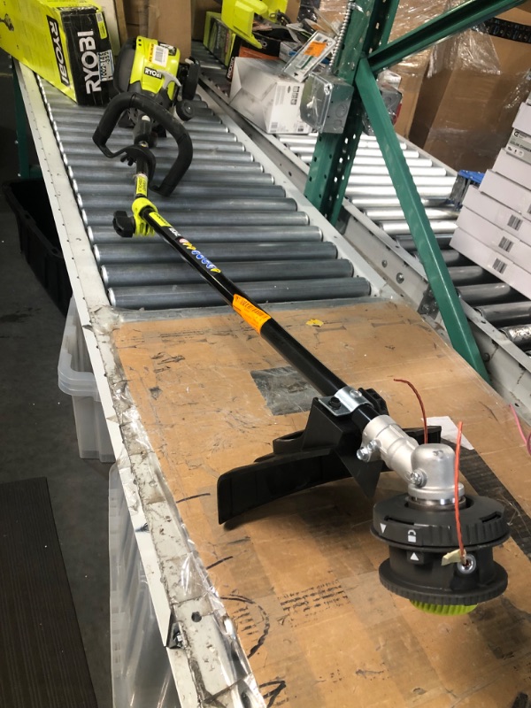 Photo 1 of ***MAJOR DAMAGE - SHAFT BENT - SEE PICTURES - UNABLE TO TEST - NO PACKAGING***
RYOBI 4-Cycle 30cc Attachment Capable String Trimmer 18 INCH