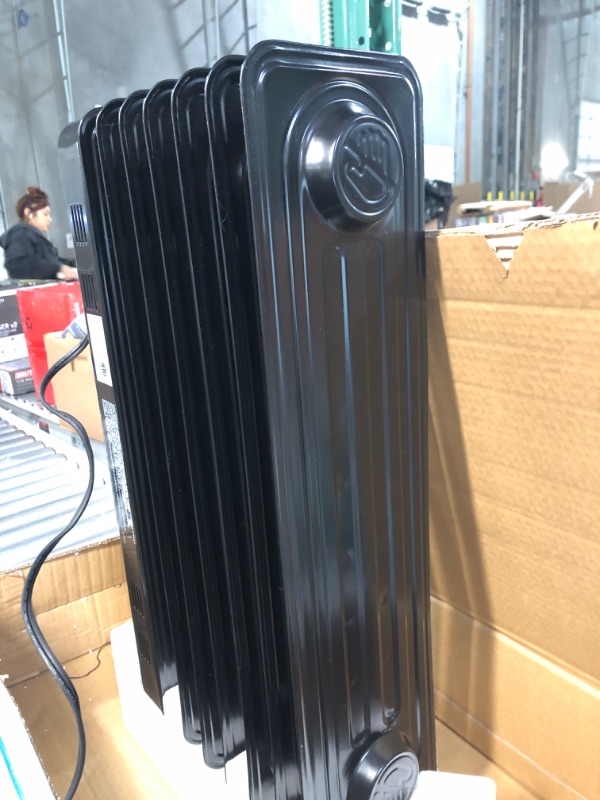 Photo 1 of ***DOES NOT WORK*******NON-REFUNDABLE*******PARTS ONLY****
Basic Electric Oil Filled Radiator,black space heater, 26.10 x 14.20 x 11.00, medium