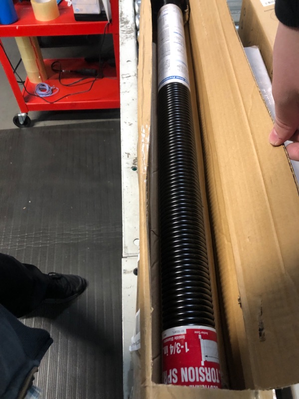 Photo 1 of Prime-Line GD 12228 Right Hand Wind Garage Door Torsion Spring – Replace Broken Garage Door Springs - .243” x 1-3/4” x 32”