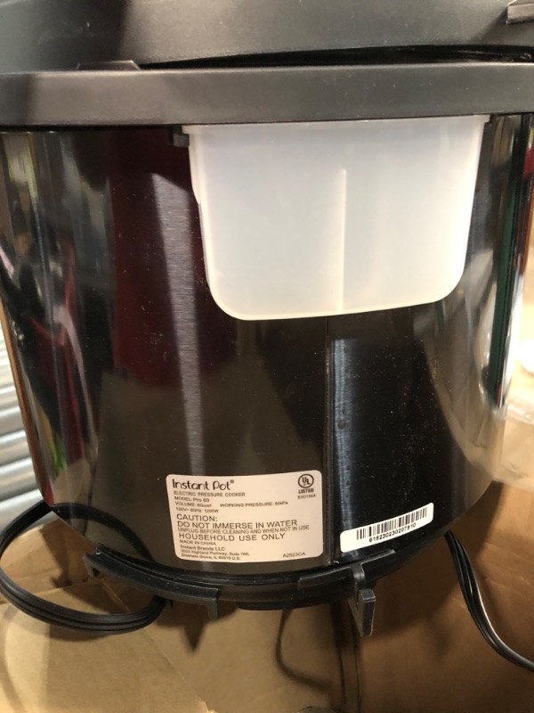 Photo 1 of **SEE NOTES/DAMAGED**
Instant Pot Pro 10-in-1 Pressure Cooker, Slow Cooker, Rice/Grain Cooker, Steamer, Sauté, Sous Vide, Yogurt Maker, Sterilizer, and Warmer, Includes App With Over 800 Recipes, Black, 6 Quart 6QT Pro