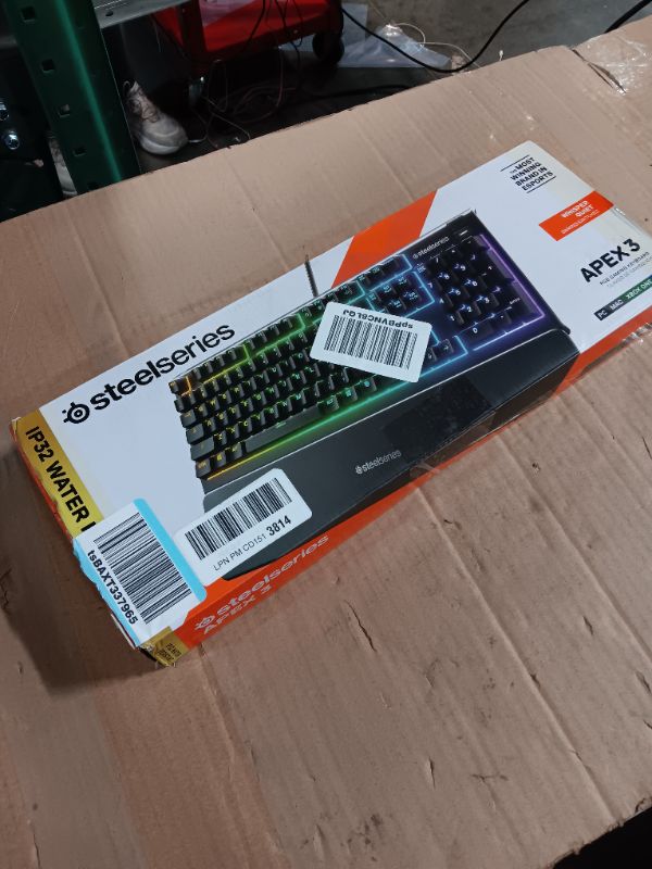 Photo 2 of SteelSeries Apex 3 RGB Gaming Keyboard – 10-Zone RGB Illumination – IP32 Water Resistant – Premium Magnetic Wrist Rest (Whisper Quiet Gaming Switch) *ORIGINAL PACKAGING* **NON REFUNDABLE**