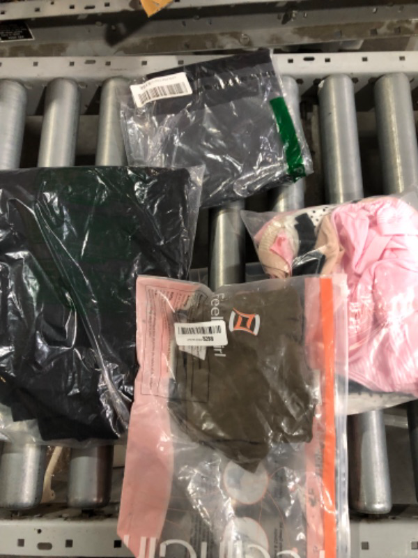 Photo 1 of **NON-REFUNDABLE** Bundle of Clothes - 4 Items