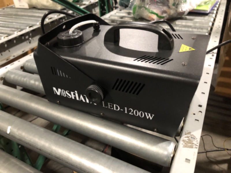 Photo 1 of Smoke Machine, MOSFiATA Fog Machine with 18 RGB LED Lights Effect, 1200W and 6000CFM Fog