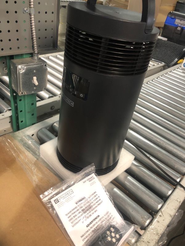 Photo 2 of **DAMAGED - SEE PHOTOS**
Utilitech Up to 1500-Watt Ceramic Tower Indoor Electric Space Heater with Thermostat and Remote Included