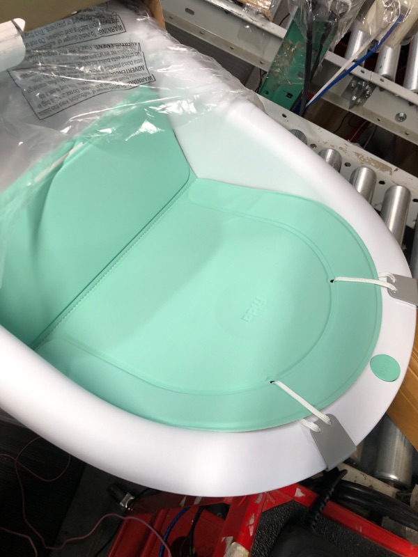 Photo 4 of 4-in-1 Grow-with-Me Bath Tub by Frida Baby Transforms Infant Bathtub to Toddler Bath 