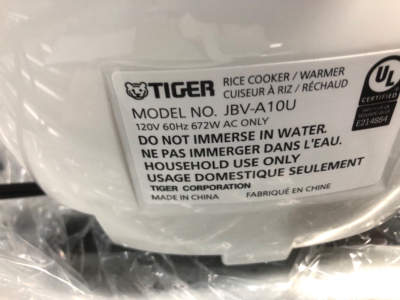 Photo 4 of ***USED - POWERS ON - UNABLE TO TEST FURTHER***
TIGER JBV-A10U 5.5-Cup (Uncooked) Micom Rice Cooker with Food Steamer Basket, White