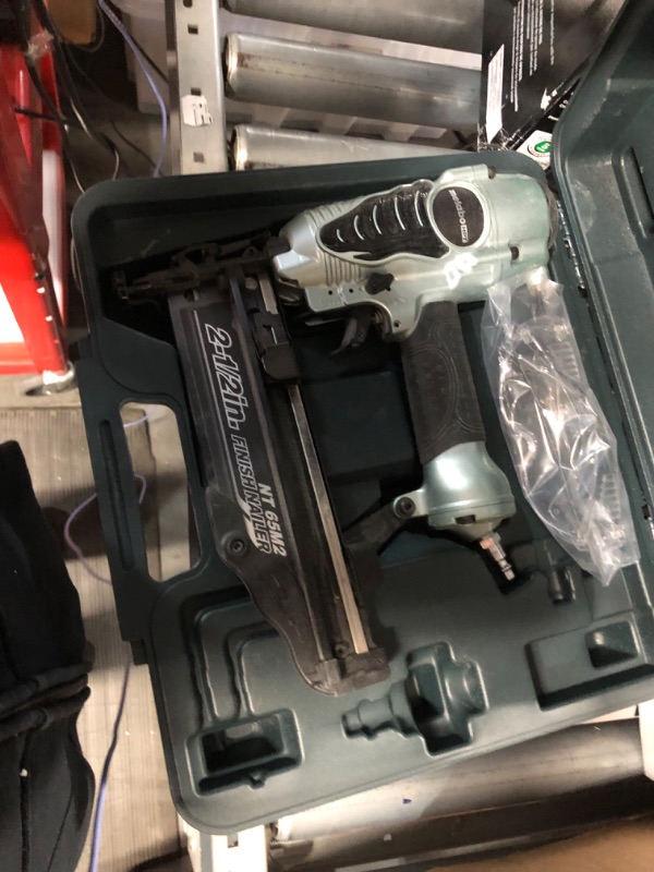 Photo 3 of **FOR PARTS ONLY**BROKEN*NON-FUNCTIONAL**
Metabo HPT NT65M2S Finish Nailer with Air Hose, 1/4" x 50' 