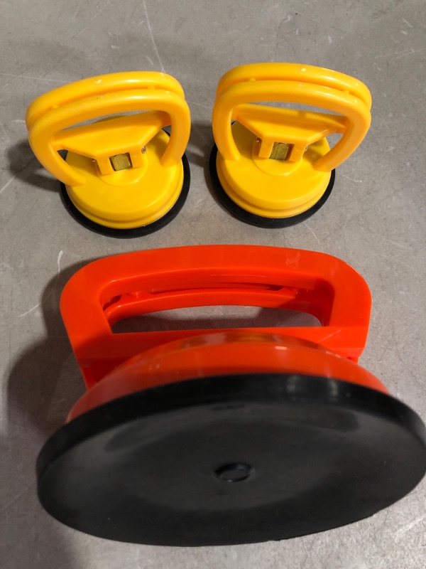 Photo 2 of Suction Cup Puller for Auto Body and Bumper Dent Repair - Also Used as a Hold Down and Lifter for Glass, Tile, Mirrors, Granite and Moving Objects Easily (Kit 1 Large & 2 Small, Orange & Yellow