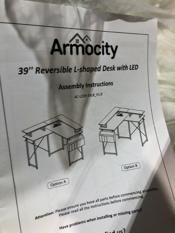 Photo 1 of armocity L Shaped Computer Desk with Power Outlets,