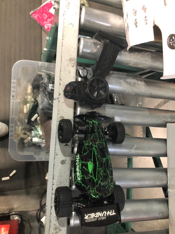 Photo 1 of ***PARTS ONLY/NON-RETURNABLE**MISSING PIECES/DAMAGED**NO CAR BATTERY*CAR BATTERY DOOR BROKEN***
Tecnock RC Racing Car,(Green&Light)