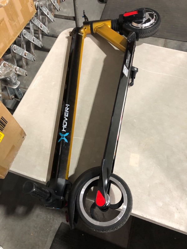 Photo 2 of ***USED - NO POWER CORD - UNABLE TO TEST - NO PACKAGING***
Hover-1 Eagle Foldable Electric Scooter with 300W Brushless Motor, 15 mph Max Speed, and 7 Miles Max Range