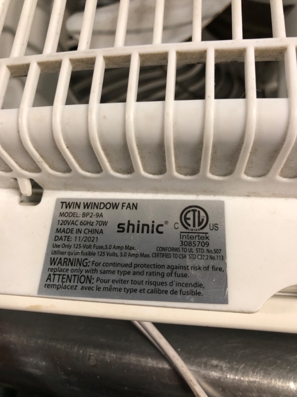 Photo 2 of **PARTS ONLY**
Shinic 9 Inch Twin Window Fan with Remote, 3 Speeds, 3 Function, Reversible Quiet Air Flow, Kitchen Exhaust 22.5"-37"