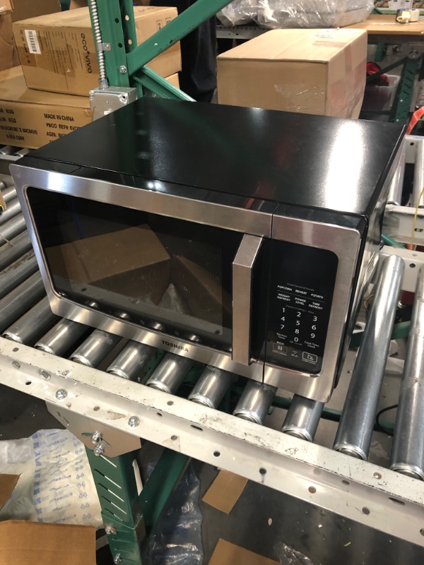 Photo 2 of **PARTS ONLY** **NON FUNCTIONAL** Toshiba Large Countertop Microwave, 6 Menus, Auto Defrost, ECO Mode, 2.2 Cu Ft, 1200W, Stainless Steel