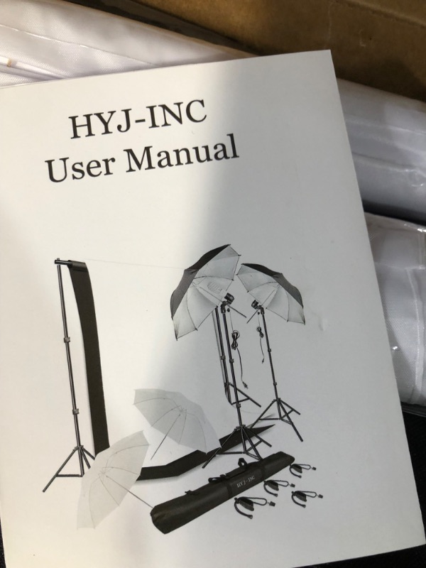 Photo 2 of HYJ-INC Photography Umbrella Continuous Lighting Kit,Muslin Backdrop Kit(White Black), Backdrop Clips Clamp,10ft 2 backdrops