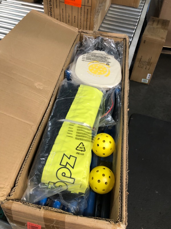 Photo 2 of ***USED - LIKELY MISSING PARTS***
Zdgao Pickleball Set with 4 Paddles and Net - Official Size Net, 4-Pickleball Paddles, and 2 Outdoor Pickleball Balls