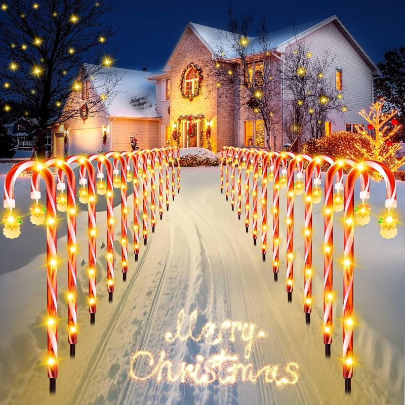 Photo 1 of 12 Pack Christmas Candy Cane LED Lights, 17 Inch Candy Cane Pathway Lights with Dangling Little Santa Claus, Waterproof Outside Christmas Decorations for Yard, Garden, Driveway, Walkway (Sets of 6)