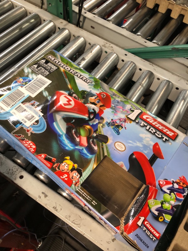 Photo 3 of Carrera First Mario Kart - Slot Car Race Track With Spinners - Includes 2 Cars: Mario and Yoshi - Battery-Powered Beginner Racing Set for Kids Ages 3 Years and Up Mario Kart w/ Spinners