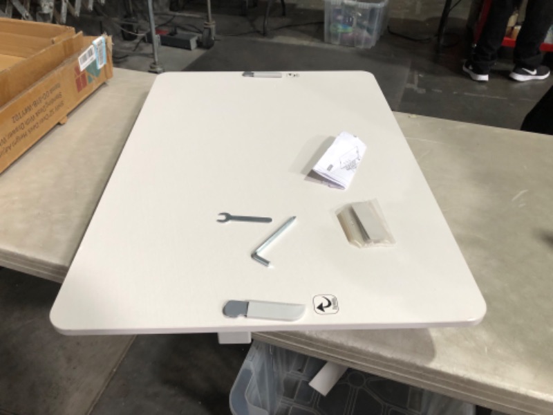 Photo 7 of ***USED - LIKELY MISSING PARTS - SEE COMMENTS***
SHW 32-Inch Height Adjustable Standing Desk Converter Riser Workstation with Drawer, White