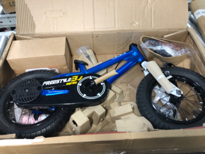 Photo 2 of ***USED - LIKELY MISSING PARTS***
RoyalBaby Freestyle Kids Bike Blue 12 Inch With Training Wheels