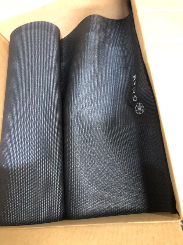 Photo 2 of  Gaiam Yoga Mat - Premium 5mm Solid Thick Non Slip Exercise & Fitness Mat for All Types of Yoga, Pilates & Floor Workouts (68" x 24" x 5mm)