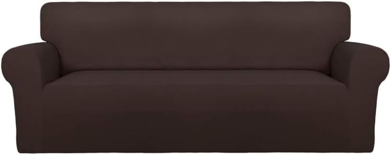 Photo 1 of ***SIMILAR TO STOCK PHOTO***Small couch cover with 2 carm covers- chocolate brown.