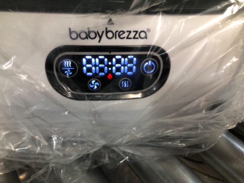 Photo 2 of Baby Brezza Baby Bottle Sterilizer and Dryer Advanced – Electric Steam Sterilization Machine – Universal Sterilizing for All Bottles: Plastic + Glass + Pacifiers + Breast Pump Parts - HEPA Filtration