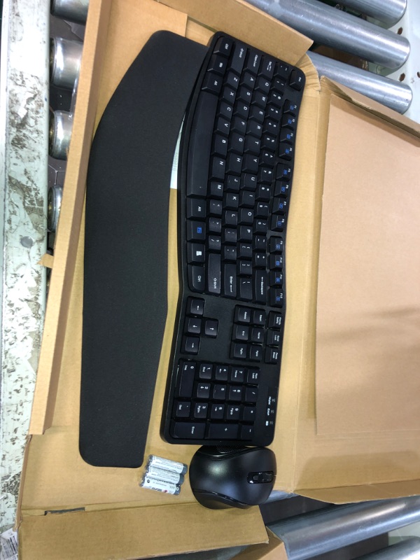 Photo 1 of Amazon Basics Ergonomic Wireless Keyboard Mouse Combo - QWERTY - Black