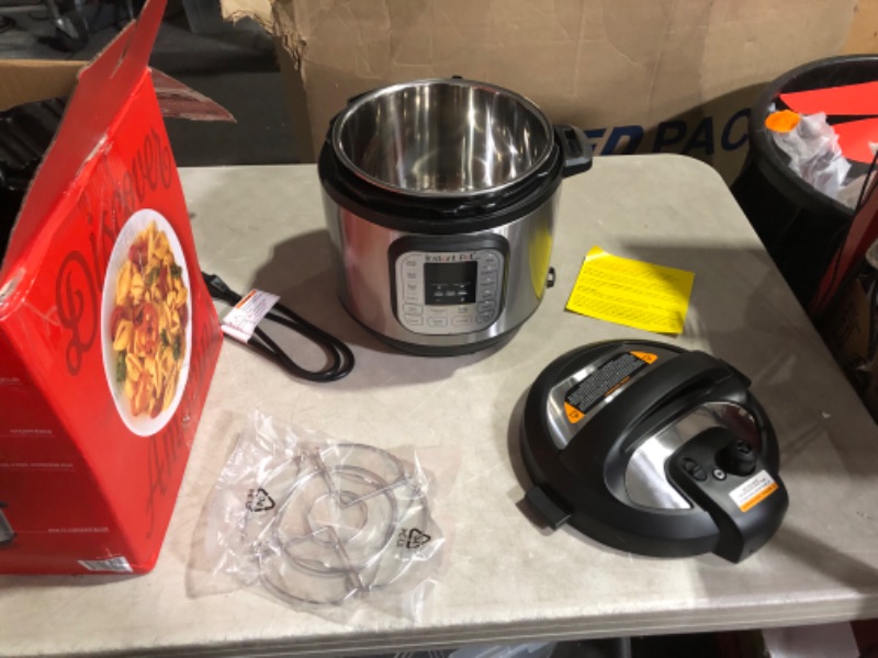 Photo 6 of ***USED - DAMAGED - UNTESTED - SEE COMMENTS***
Instant Pot Duo 7-in-1 Electric Pressure Cooker, Slow Cooker, Rice Cooker, Steamer