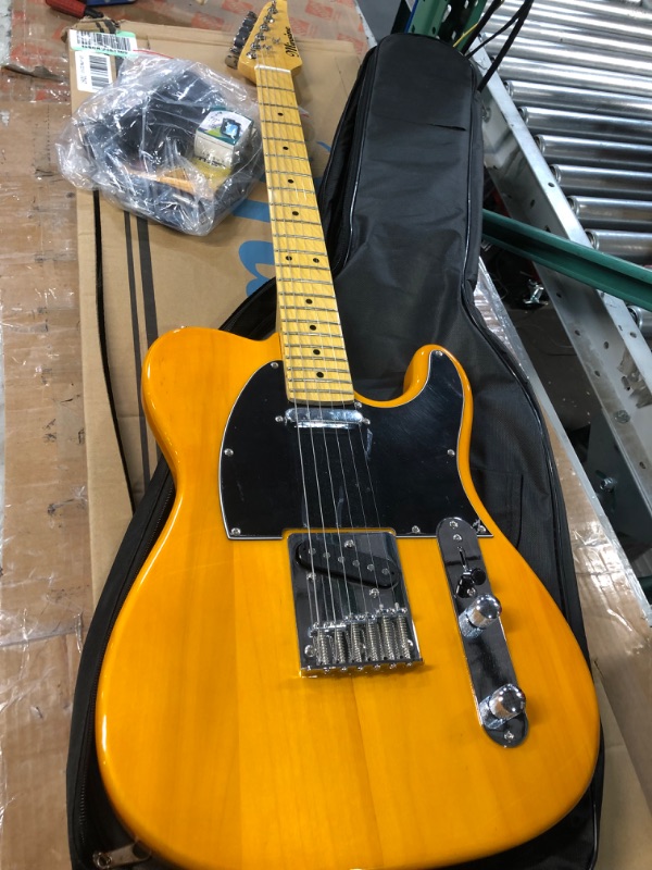 Photo 1 of Fender Squier Affinity Telecaster w/Maple Fingerboard- Butterscotch Blonde Bundle with Gig Bag, Tuner, Strap, Picks, and Austin Bazaar Instructional DVD