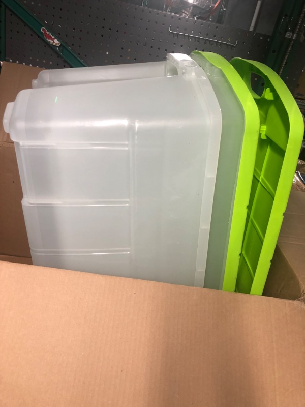Photo 1 of Rubbermaid 28 Gallon Jumbo Clear Tote, Pack of 2, Stackable, Large Capacity, Clear Bins/Bright Green Lids, Home, Garage, and Office Storage Organizer, Durable Snap-Tight Lids