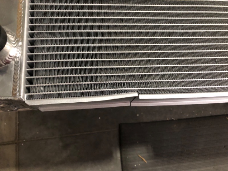 Photo 5 of ***DAMAGED - RADIATOR BENT - FINS SCRATCHED - SEE PICTURES***
Mishimoto MMRAD-LCR-99 Performance Aluminum Radiator, Compatible With Toyota Land Cruiser J100 (2UZ-FE) 19982007, silver