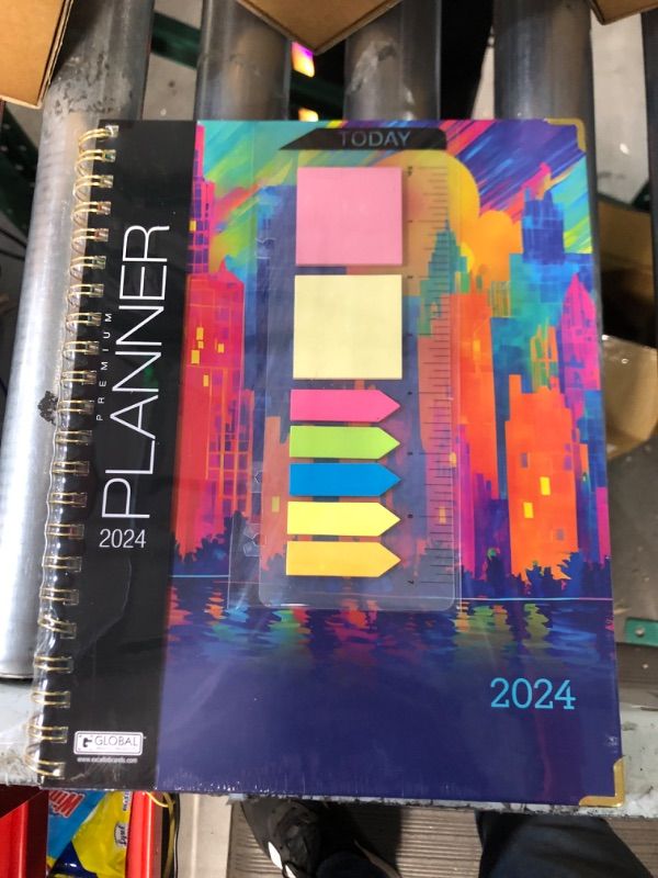 Photo 2 of HARDCOVER 2024 Planner: (November 2023 Through December 2024) 8.5"x11" Daily Weekly Monthly Planner Yearly Agenda. Bookmark, Pocket Folder and Sticky Note Set (Rainbow Cityscape) LARGE: 8.5" x 11"