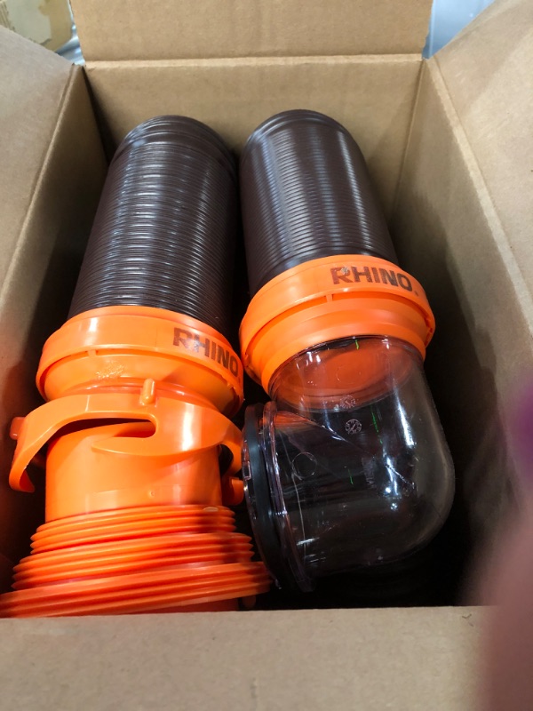 Photo 1 of Camco RhinoFLEX RV Sewer Hose Kit with Swivel Transparent Elbow and 4-in-1 Dump Station Fitting, Brown, 15 Feet (39770) 15ft Sewer Hose Kit Frustration-Free Packaging