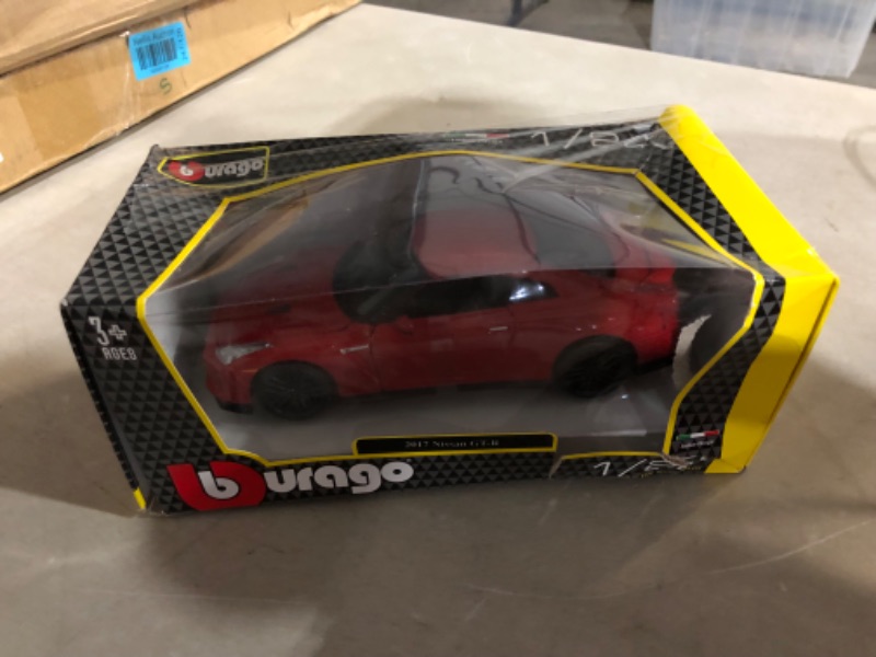 Photo 6 of ***DAMAGE TO PACKAGING.***PICTURED***
Nissan Bburago GT-R 2017" Diecast Model  1:24 Scale, RED B18-21082