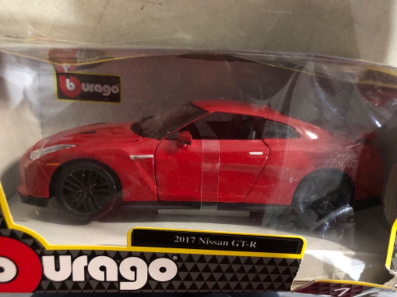 Photo 2 of ***DAMAGE TO PACKAGING.***PICTURED***
Nissan Bburago GT-R 2017" Diecast Model  1:24 Scale, RED B18-21082