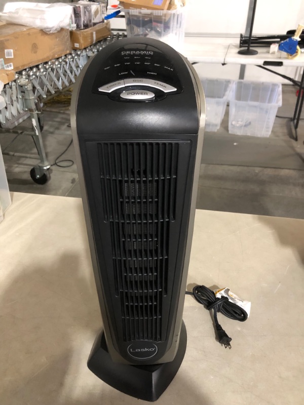 Photo 1 of ***NONREFUNDABLE - NOT FUNCTIONAL - FOR PARTS ONLY - SEE COMMENTS***
Oscillating Ceramic Tower Space Heater 22.5 Inches, Grey/Black, 1500W, 751320