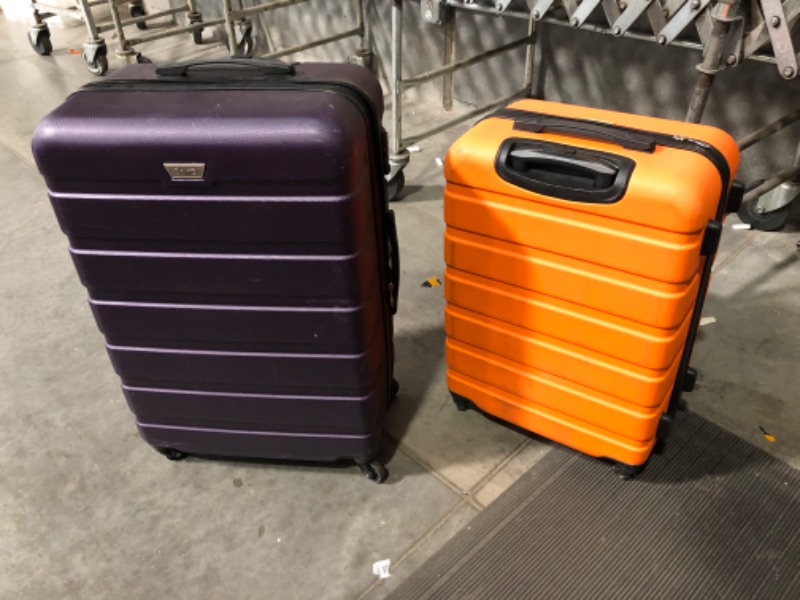 Photo 1 of ***MAJOR DAMAGE - SEE COMMENTS***
Coolife Luggage, 2 Pieces, 24" Orange and 28" Purple